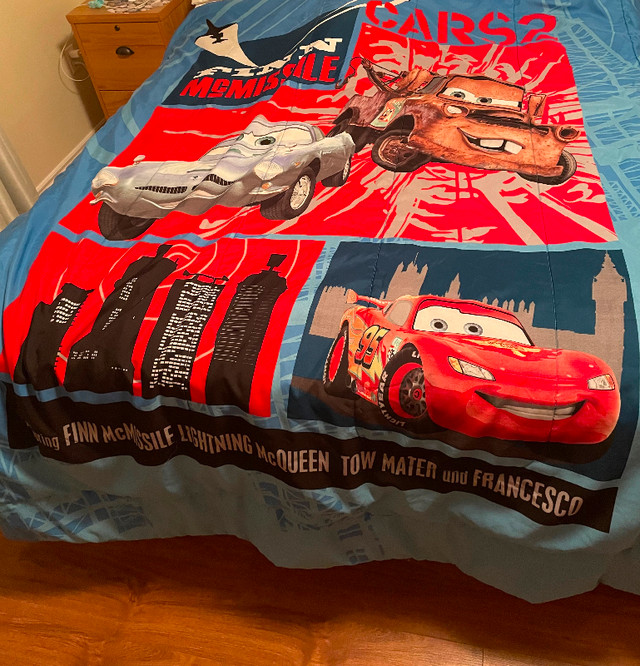 Double Disney cars reversible comforter from a smoke free home in Bedding in Bedford