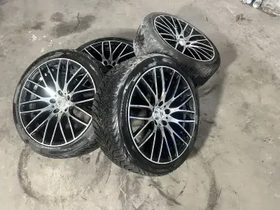 A set of Winter tire , on after market wheel, 235 40 18 Bolt pattern 5x114.3 +1 587-418-5767 Call /...