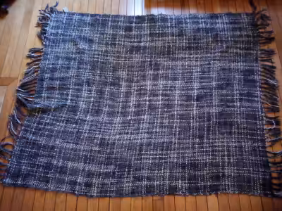 Grey and white BRAND NEW Urban Barn Blanket. Approx 5'5" X 4'. Very nice throw to keep you warm on t...