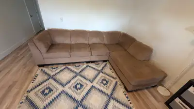 Beige suede 3 piece sectional. In great condition. A few small marks captured in photos. Can be take...