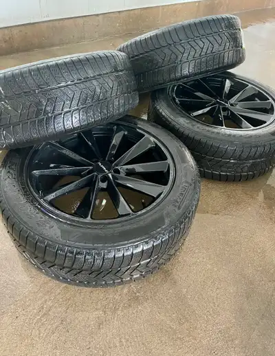 4xR20 255/55 Pirelli Scorpion winter snow tires mounted on Ruffino rims for sale. Tires good for ano...