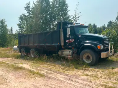 2002 Black Mac dump truck. Air lift removed as it was not steerable. Was on the road Last season. No...