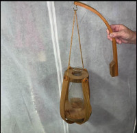 Hanging outdoor candle holder