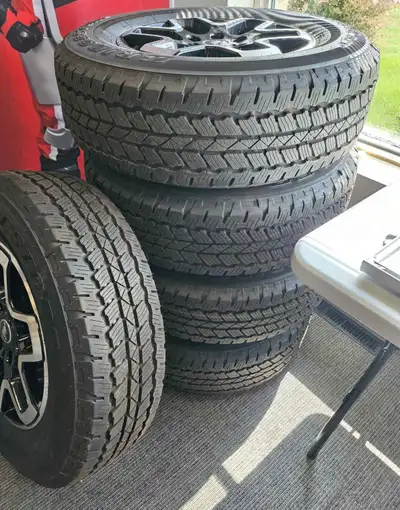 Set of 5 Brand New Bridgstone Dueler AT Take Offs and Rims. Never used, had bigger tires and rims pu...