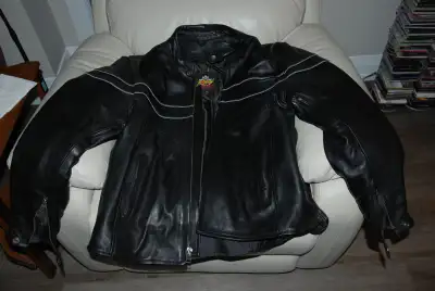 Motorcycle gear.  Helmet, gloves, jacket, rain suits., View more