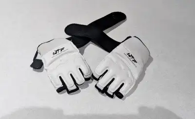 Pair of fighting gloves, great for any martial arts, MMA, or training, in excellent condition, size...