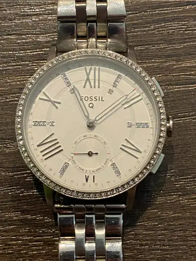 Fossil Q Smartwatch Has been tested with the Fossil Smartwatch App. New battery put in. Comes with i...