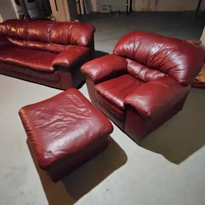 Leather sofa, love seat and chair with ottoman looking for a new home. Some armrest damage can be to...