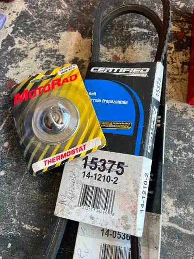 I don’t like throwing stuff out. New Stat and couple belts! Ford VA 460 V8
