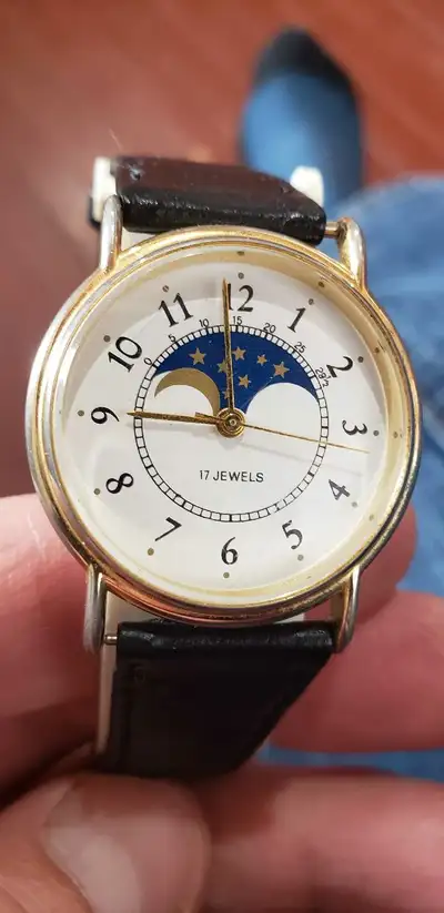The one watche is a Milan quartz tripple crown and the other mens is 17 jewell manual wind missing t...