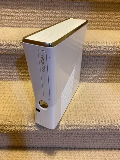 Xbox 360 Slim console, View more