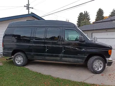 Selling my Ford e250 (econoline) which is camperized inside: double bed, sink, lots of storage, Reno...