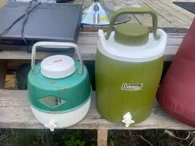 These vintage Coleman beverage coolers are perfect for your next outdoor adventure, featuring a set...