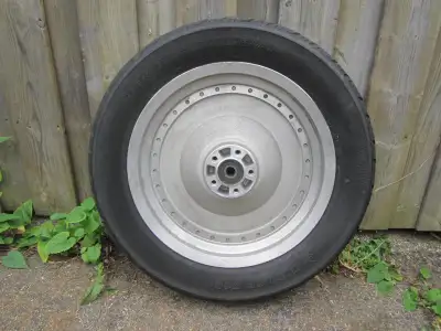 This is a 16x3 inch solid wheel with a 3/4 inch axle bearings. It will fit almost any Shovelhead or...