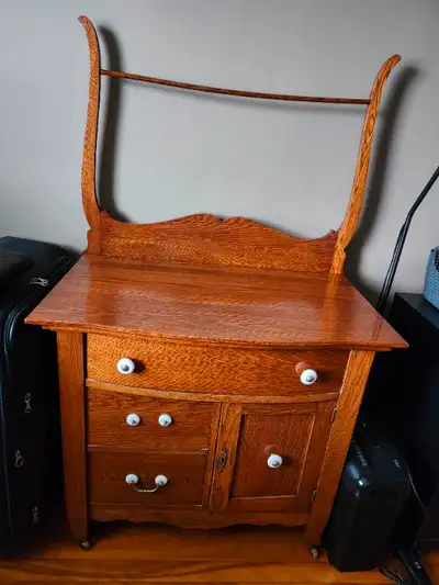 Solid oak, circa 1889, Hagersville area, multi use, towel rod can be removed. 32" wide by 19" deep b...