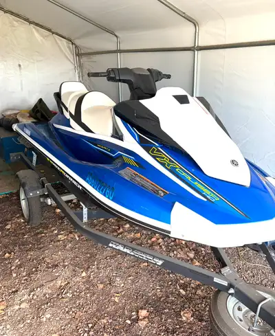 Low hours. Indoor storage. Karavan trailer included. Able to easily pull tubes, wakeboards, waterski...