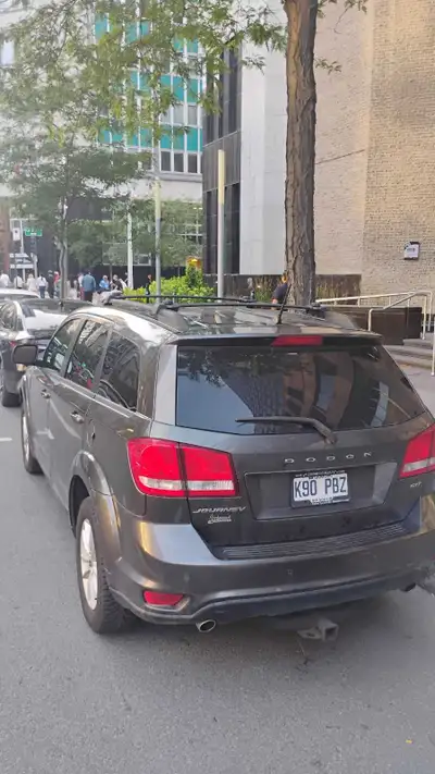 This pre-owned Dodge Journey SXT is a versatile SUV that combines practicality with comfort for your...