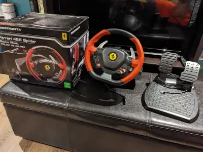 Racing Wheel for XBOX, works great with games like Forza. Includes wheel, pedals and box. In good wo...