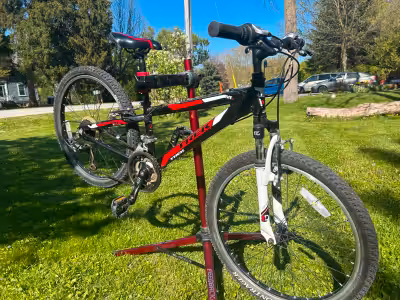 TREK MT220 Youth Mountain Bike Perfect for young riders ready to hit the trails. * Wheel Size: 24-in...