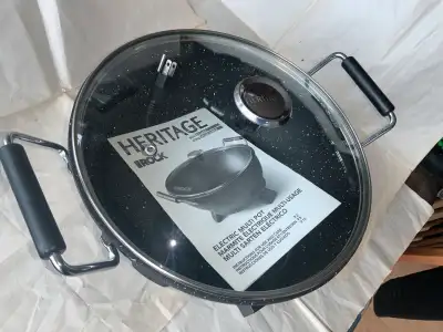 This electric, non-stick multipot is new, never used. No box. Featur:es: ~ 4.5 L (4.8 quart) electri...