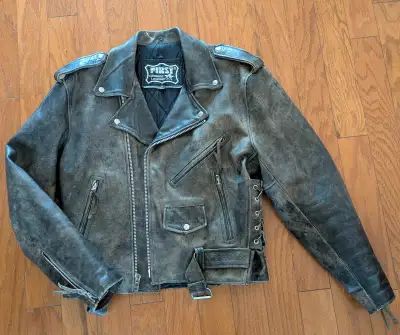 Distressed Leather Motorcycle Jacket. Men's size Medium but fit is large