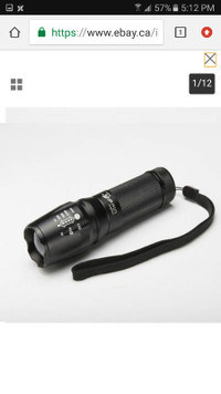 Brand New Bright Zoomable T6 LED Flashlight. AAA battery.