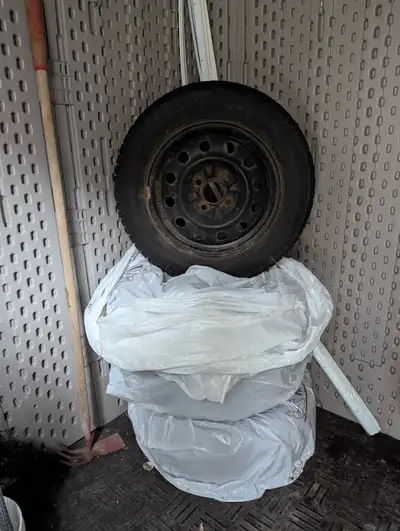 4 used Tiger Paw Ice and Snow II tires on rims. Good condition. Only selling because I sold my Nissa...
