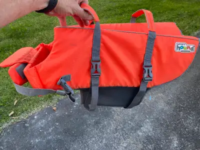 Outward Hound branded life vest for dogs. Size XL. Used maybe a dozen times by our 95 pound dog. Gre...