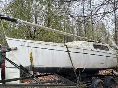 23 ft sailboat and trailer for sale(tires were inflated and appear to be staying full). As is, needs...