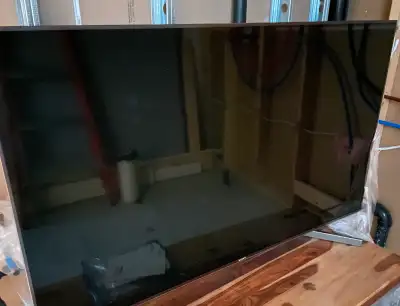 Sony Bravia 55X900F. Screen is cracked. All other tv components working. Selling as is.