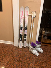 110 ski boots with boots and poles . Full set .