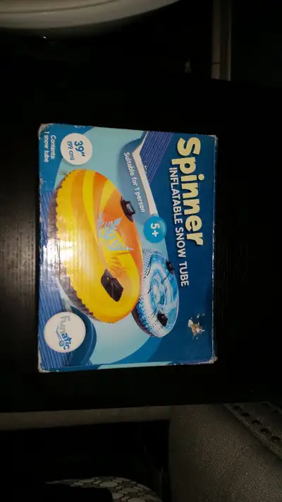 Brand new inflatable snow tube for sale never used $10, View more