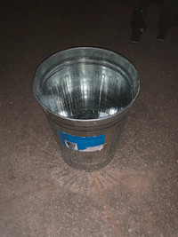 Metal garbage cans or metal planters $25 each