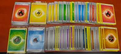 -Exact amount of energy cards is unknown -Some are still in their plastic packaging from Build a Dec...