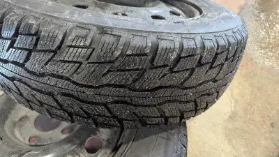 Uniroyal - P225/65R17 102T Tiger Paw Ice & Snow tires purchased new October 2025. Rims are two year...