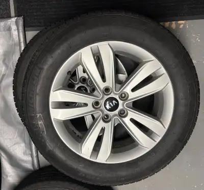 KIA Alloy Rims and Michelin X-Ice Tires (used). Size 225 60R 17. Rims and tires were used on a 2018...