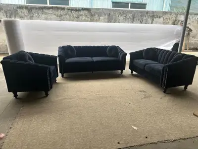 This stylish velvet sofa set includes a sofa, loveseat, and armchair, perfect for adding a touch of...