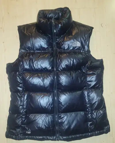 Ladies North face 700 down glossy puffer vest. In near mint condition. $140.00 Ladies Arc'teryx hood...