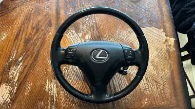Steering wheel out of a 2006 Lexus gs430 Everything functions, comes with airbag. No longer have the...