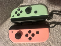 Nintendo Switch, two games, two controllers