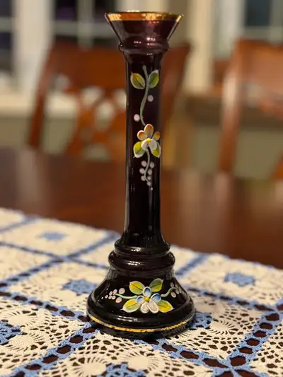 This is a beautiful vase with handpainted flowers and gold guiding around the rim of the vase. Perfe...