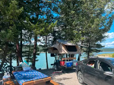 5x8 Canada trailer with XL smitty built roof top tent mounted to aluminum frame. Sturdy strong and l...