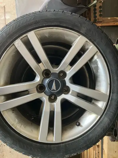 Set of 4 , 245/4518 M&S Tires and rims. Still good life left in the tires. About 35% - 40% worn . $1...