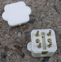 Old style 4 pin phone plug and old style 4 pin dual phone outlet
