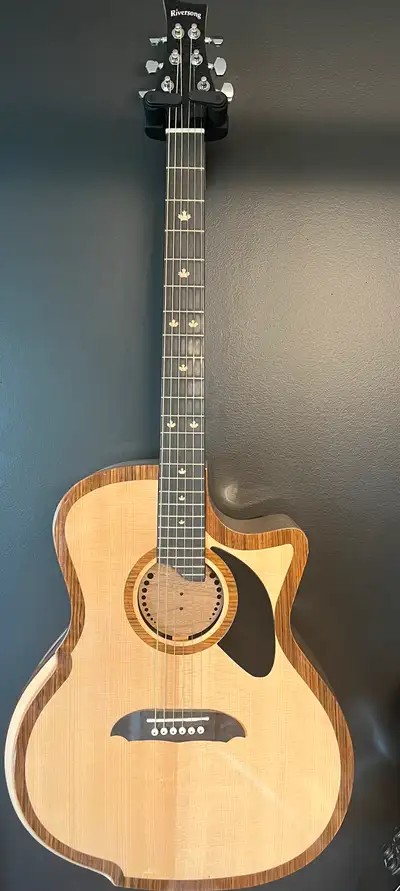 Riversong acoustic electric guitar with case, View more
