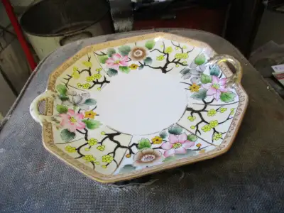 Selling quickly at $10.00......its 9 1/2 inches x 10 3/4 inches x 1 1/2 inches tall in size...... Ca...