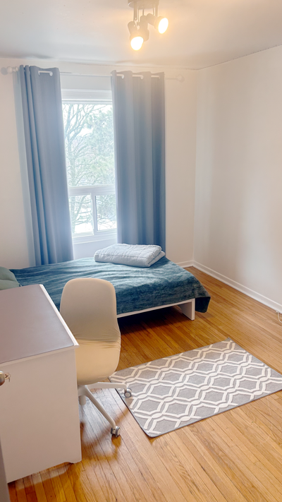 Bright furnished bedroom available in a clean townhouse on the second floor. Ideal for a student or...