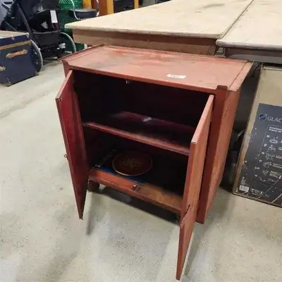 27 inches wide 12 inches deep 26 inches high Heavy duty tool cabinet. Work bench Used but works good...