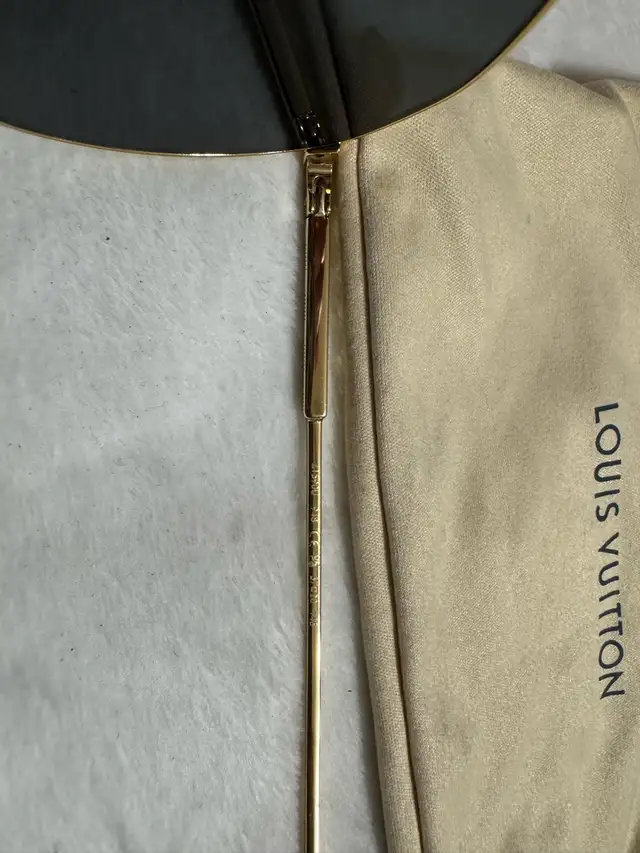 Louis Vuitton Gold and Black Sunglasses in Other in City of Toronto - Image 10