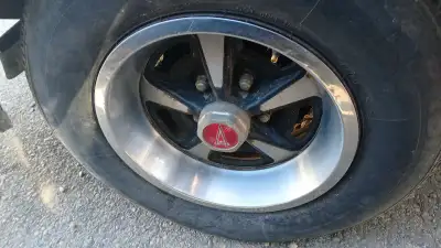 Pontiac rally muscle car rims and tires Tires seem ok but have stress cracks Bolt pattern 5x115 Curr...